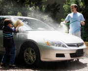 Father and Son Washing Car