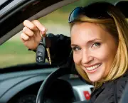 woman shows keys from the car