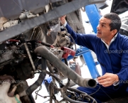 Mechanic fixing car problem