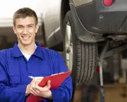 Car Mechanic Holding Clipboard